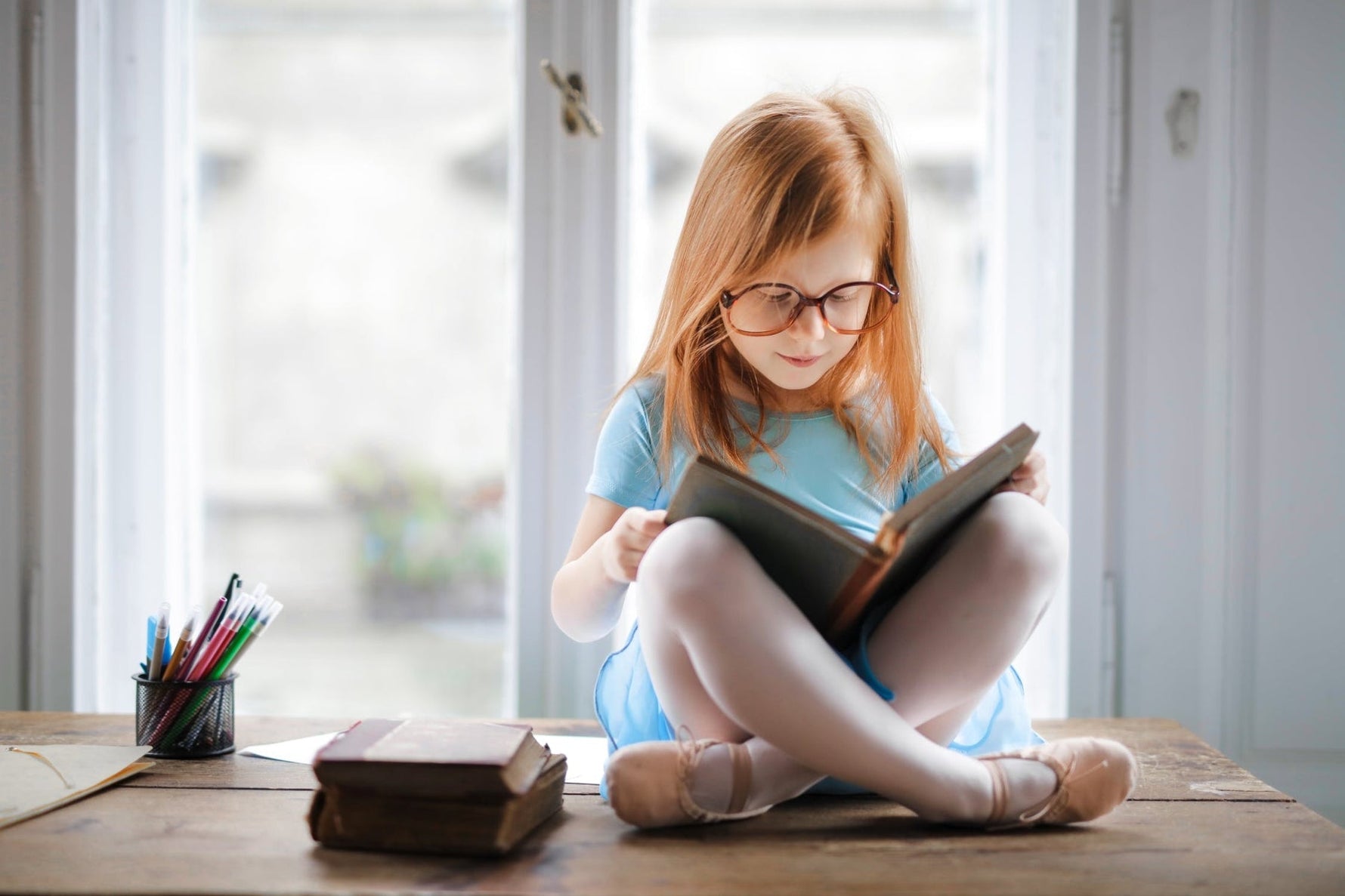 Girl reading a school book