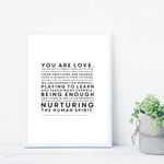 The Mindful Manifesto Poster displayed next to a house plant.